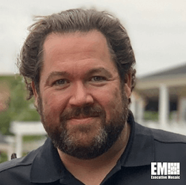 A headshot photo of Curtis Arnold